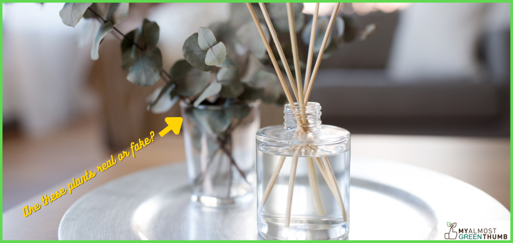 decorate with artificial flowers by Creating a DIY diffuser with a glass bottle, scented oils and artificial flowers